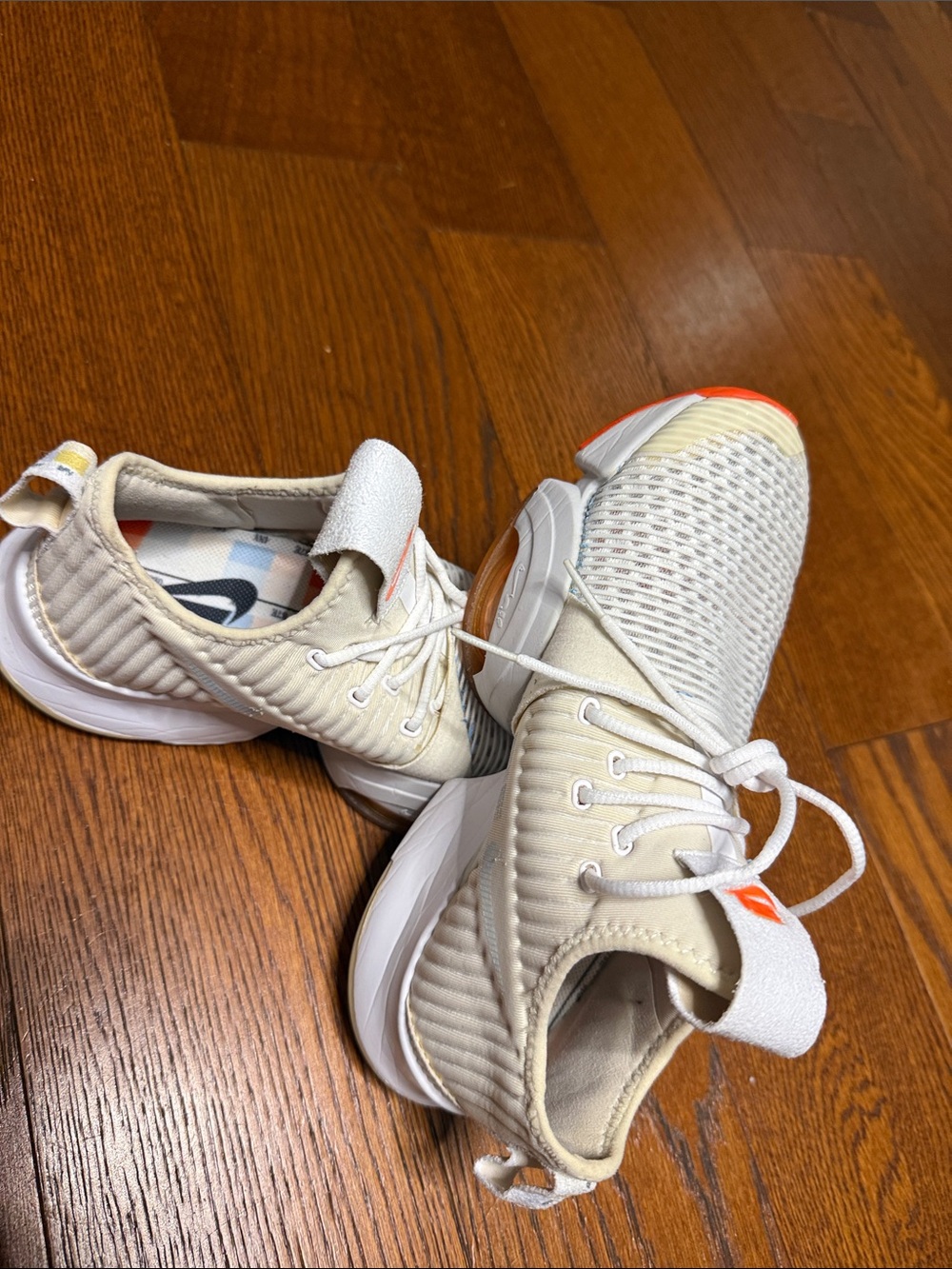 Nike Men’s White Knit Running Shoes with Orange Accents